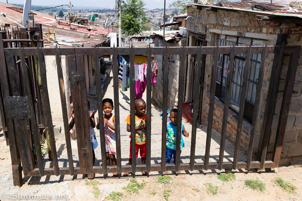 Kids watching the cycle ride in Alex