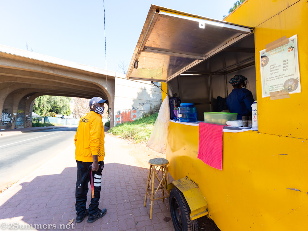 Man outside Mbali's food trailer