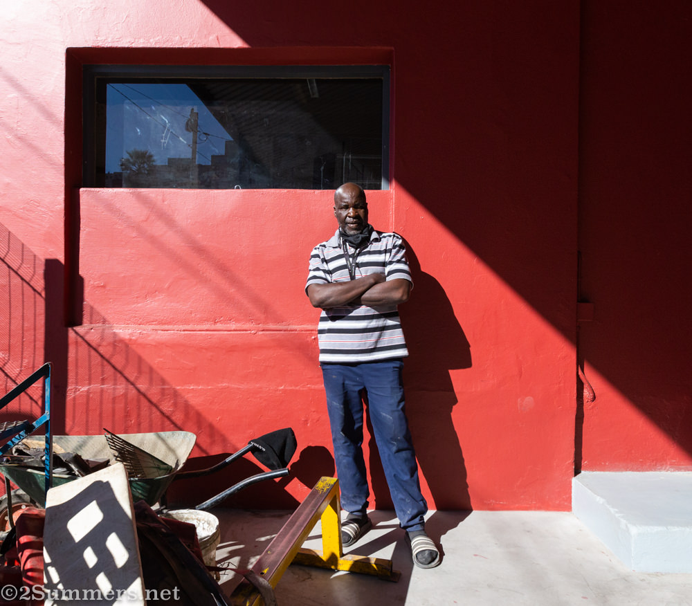 George standing where his sign used to be