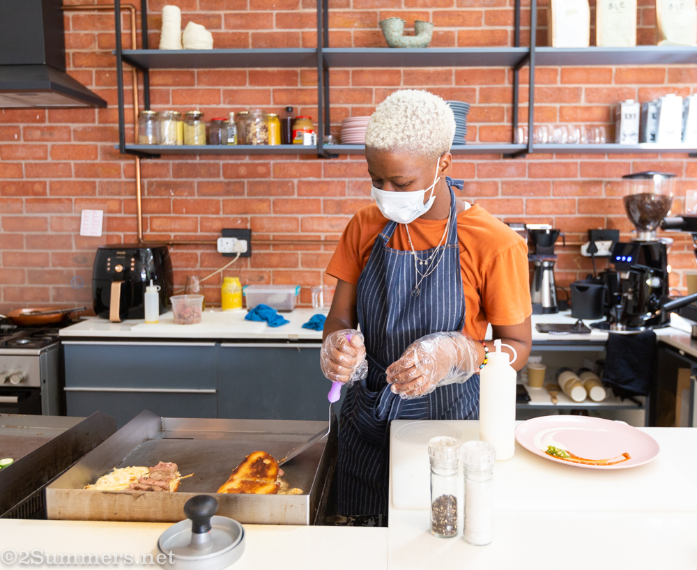 Xai Xai making a Philly Cheese Steak toastie