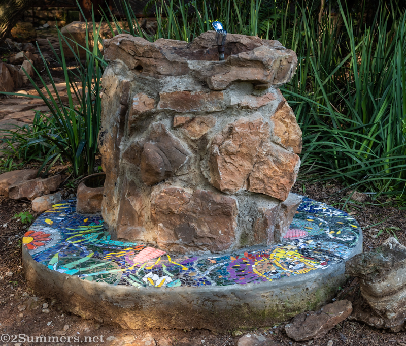 Mosaic water fountain in the Wilds