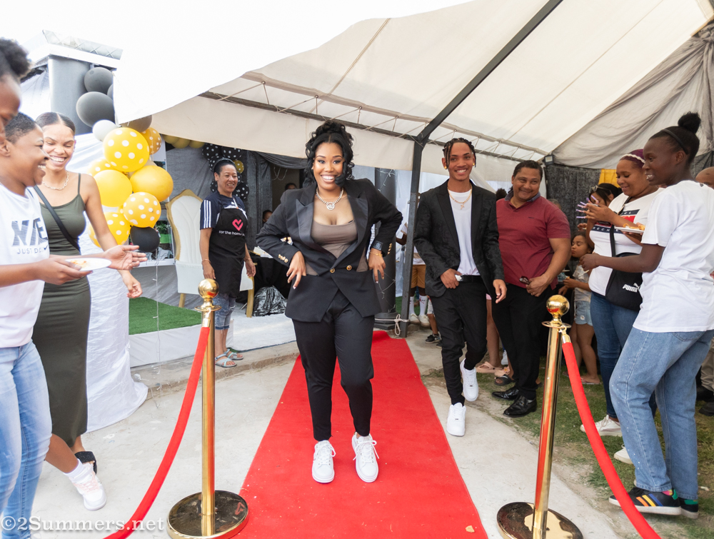 Micayla dancing down the red carpet.