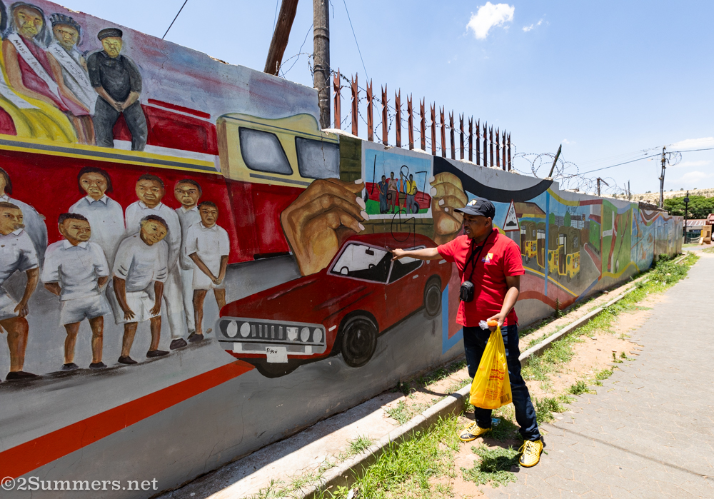 Fabian describes the historical imagery on one of Bulte's biggest murals