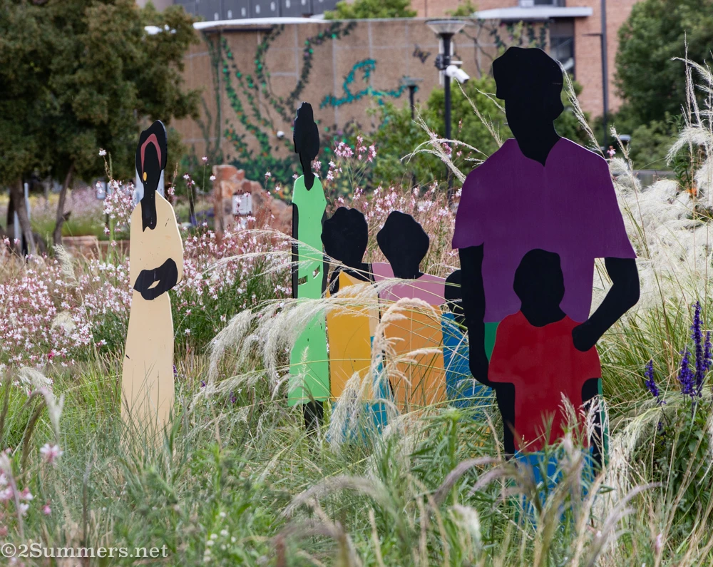 Family silhouette artwork in the park